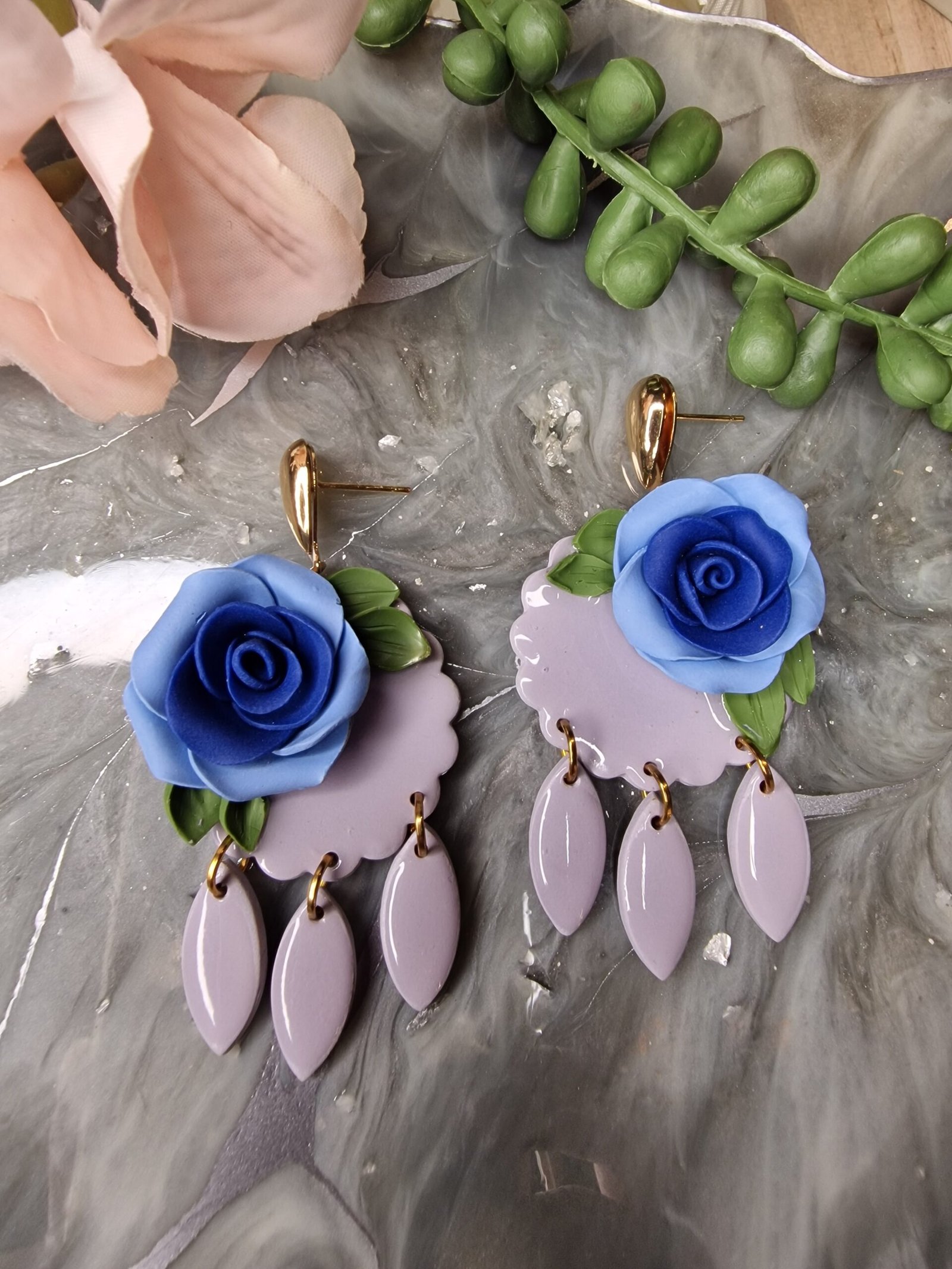 Single blue rose drop earrings